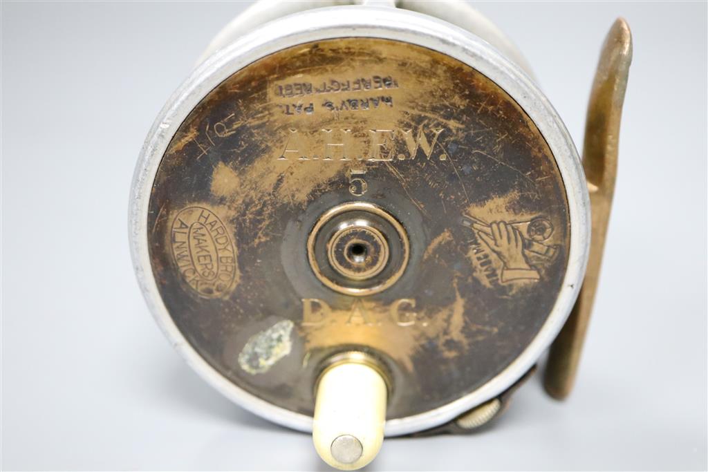 A Hardy No.5 fly reel with leather case